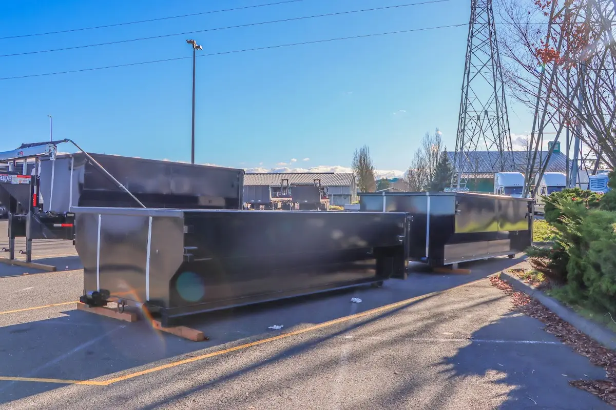 Roll-off dumpster ready for waste disposal at job site for 2 Yard Dumpster Rental in Platteville